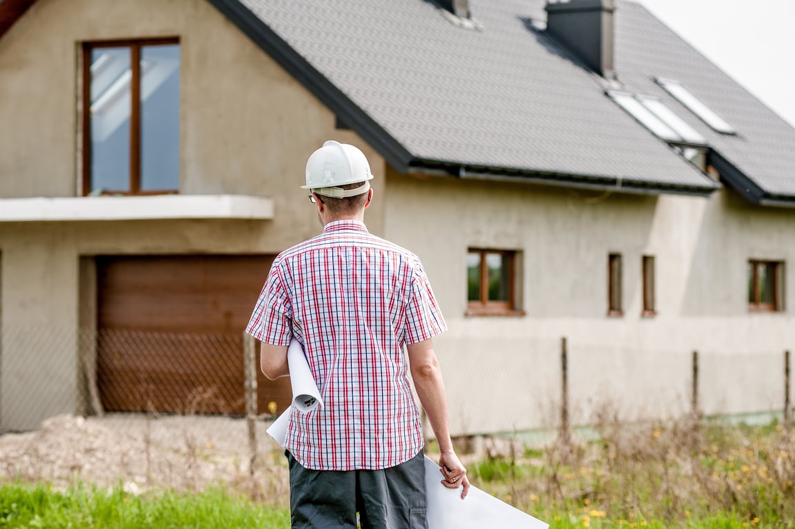 home renovation contractor reviewing plans