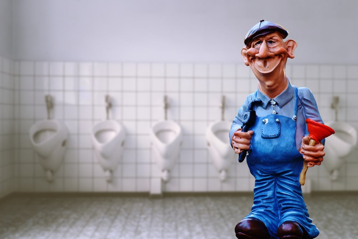 plumber repairing concrete slab